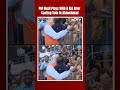 PM Modi In Ahmedabad | Watch: PM Modi Plays With Child As He Greets Crowd After Casting His Vote  - 00:57 min - News - Video