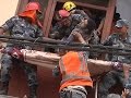 AP : Raw: Man Rescued From Building in Nepal