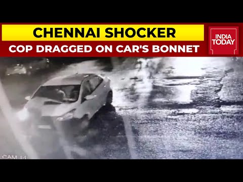 Video: Chennai cop trying to stop kidnappers dragged on car’s bonnet Video: Chennai cop trying to stop kidnappers dragged on car’s bonnet