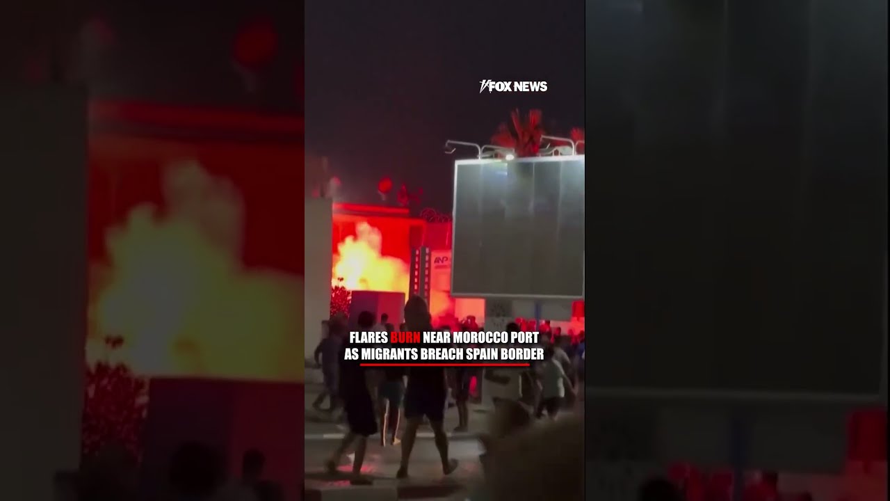 FLAMES BURN as migrants breach Spain border #foxnews #news #us #fox