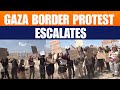 Protesters March to Gaza Border Demanding End to War | Israel-Palestine Conflict | News9