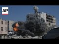 Strikes continue across Gaza City as Palestinians forced to evacuate