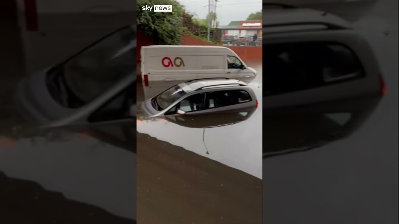 Cars trapped in floodwaters