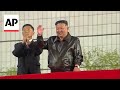 North Korean TV shows Kim Jong Un opening new apartment development project