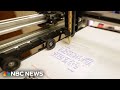 This artificial intelligence robot handwrites letters for you