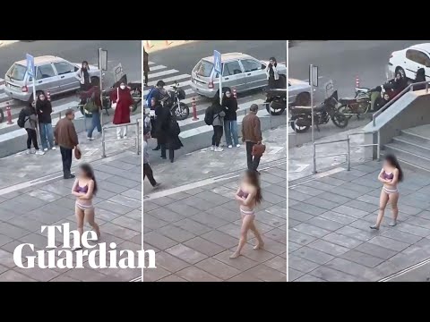 Iran arrests woman who stripped to underwear in protest at ‘abusive’ dress code policing