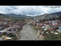 Shocking footage: Homes near collapse in Bolivia #heavyrain #drone