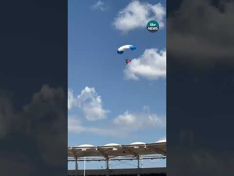 Rugby match delayed in France after parachutist left hanging from roof #itvnews