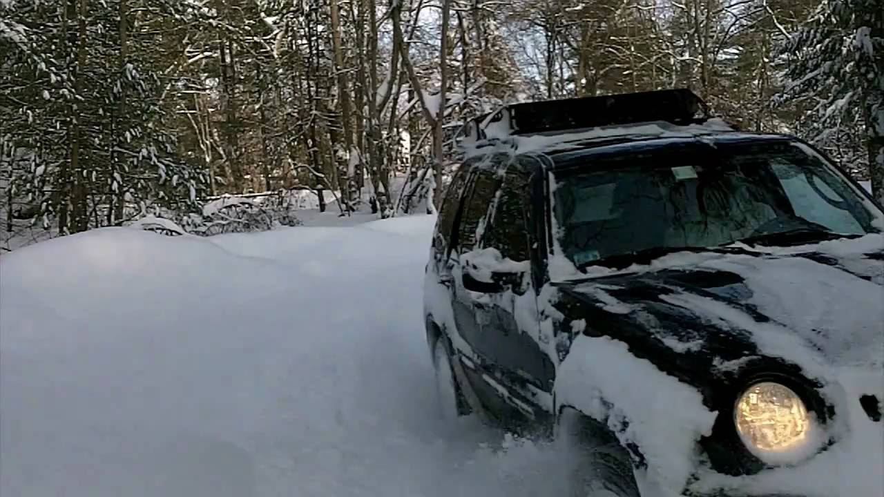 Jeep liberty in deep snow