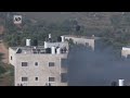 Palestinian residents try to douse fire in West Bank village attacked by Israeli settlers  - 00:56 min - News - Video
