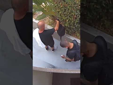 Two people tried to break into this condo while the resident was home.