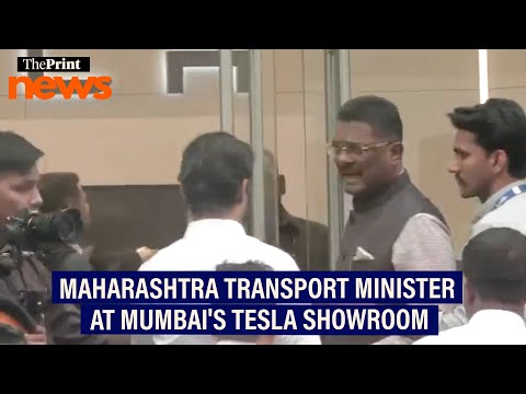 Maharashtra Transport Minister Pratap Sarnaik arrives at Tesla showroom in Mumbai