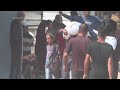 Palestinians say people are being shot while trying to collect aid in Gaza - 00:59 min - News - Video