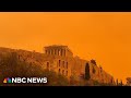 Video shows Athens landmarks shrouded in orange dust