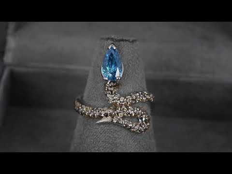 Кольцо «Змея» из белого золота с топазом и бриллиантами