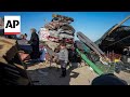 Palestinians collect belongings and leave Rafah in southern Gaza to find safety