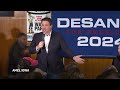 DeSantis interrupted by three protesters at campaign stop days before Iowa caucuses - 01:28 min - News - Video