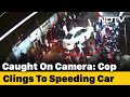 Caught on camera: Cop clings to speeding car's bonnet in Madhya Pradesh