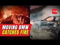 Watch: Moving BMW car catches fire
