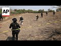 Volunteers search for clandestine crematorium on outskirts of Mexico City