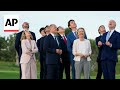 G7 leaders mingle with each other, watch parachute display at Italy summit