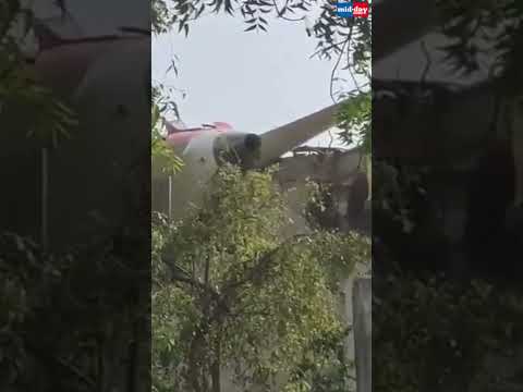 Ahmedabad Plane Crash Air India flight wreckage seen lodged in hostel building  64 thousand views  play Short