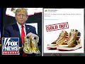 GOLDEN TICKET: Trumps official sneaker sells out hours after release