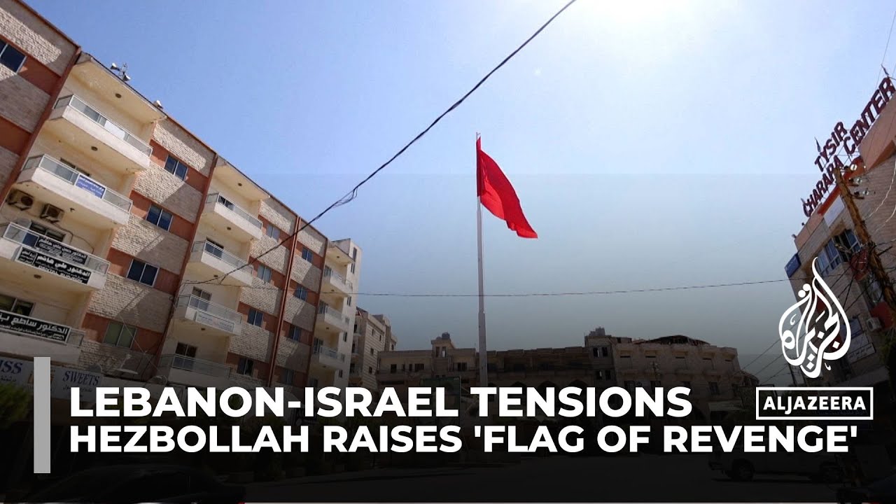 Hezbollah raises 'flag of revenge' in southern Lebanon, signalling a response to Israel's actions