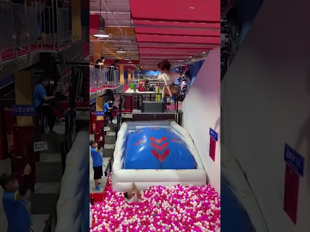 Guy Fails, Girl NAILS it! 🤯 Ball Pit Jump Challenge Gone Wild #funny #ShortsFeed #ViralShorts