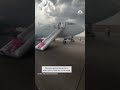 Passengers evacuated from American Airlines flight after a problem with aircrafts landing gear