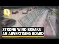 Caught On Camera : Strong Winds in China Blows Over an Advertising Board