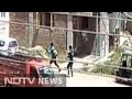 Terrorists with Ak-47s fire at police in attack caught on camera in Kashmir