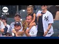 Father catches foul ball at Yankees Stadium as daughter covers eyes