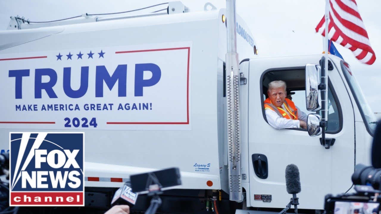 Trump stuns in sanitation outfit while giving presser from garbage truck