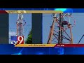 Farmer climbs cell tower to protest against land encroachment
