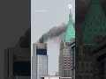 Smoke billows from roof of 72-story building in Lower Manhattan  - 00:23 min - News - Video