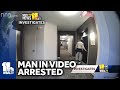 Man seen trying to enter apartment doors arrested, charged