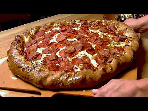 The Biggest Pizzas Ever Eaten On Man V Food