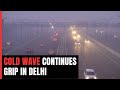 Cold Wave Continues Grip In Delhi, People Witness Thin Layer Of Fog