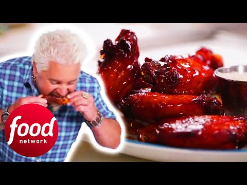 "Messy, Nasty, and Tiki!" Guy Fieri Tries Fiery Southern Chicken Wings  | Diners Drive-Ins & Dives