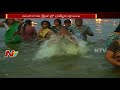 Devotees Rush to Godavari Ghats on Occasion of Karthika Masam