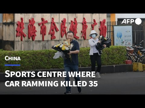 Rain and flowers at southern China sports centre where car ramming killed 35 | AFP