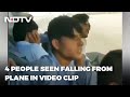 Selfie video of Afghan people sitting on US plane wing prior to fall off mid-air