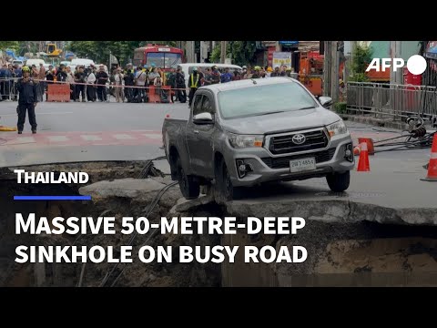 Massive sinkhole in Bangkok street forces evacuations | AFP