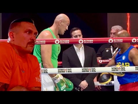 Usyk watches on as tyson fury dodges punches from coach sugar hill