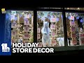 Ellicott City shopkeepers decorate store windows for holidays