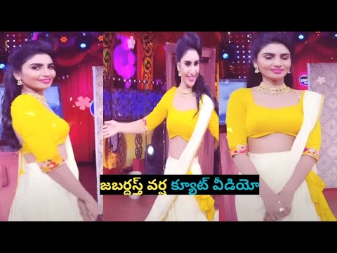 Jabardasth Varsha in traditional wear with mysterious tattoo on back Jabardasth Varsha in traditional wear with mysterious tattoo on back