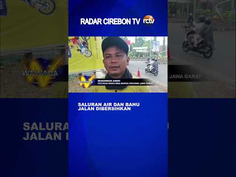 Saluran Air dan Bahu Jalan Dibersihkan