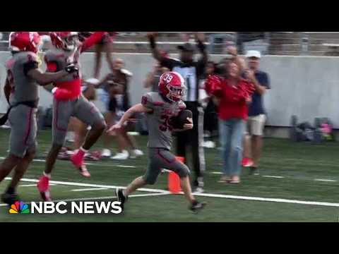 Student with Down syndrome scores touchdown during high school football game