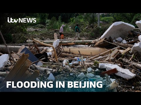 At least 30 people dead and 80,000 evacuated after heavy flooding in Beijing | ITV News